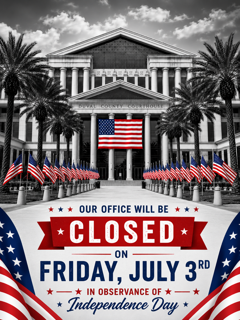 black and white photo of the Duval County Courthouse with American flags in front